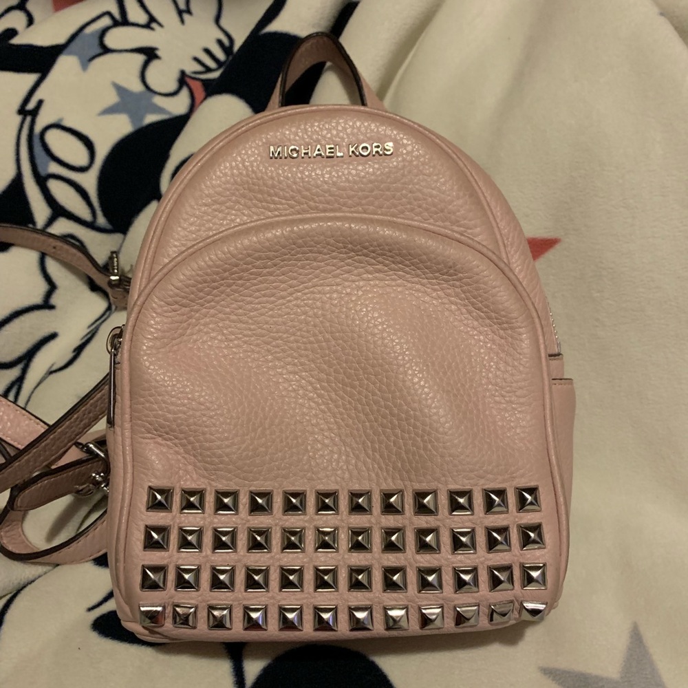 small light pink backpack - multiple ways to wear